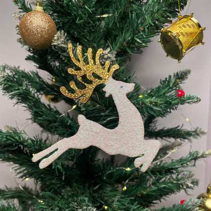 Decorative Christmas wreath with gold and silver ornaments on a plain background